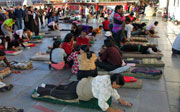 Pilgrims prostrate themselves
