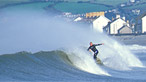 A surfer at Borth
