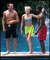 Paul, Hannah and Bradley from S Club 7 show off their bellies.