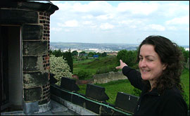 Clare Dykes on the roof of Sheffield Manor Lodge