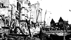 Black and white view of air raid destruction to Kilbowie Road in Clydebank.