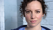 A bruised Kirsty (Lucy Gaskell) has her secret uncovered by Adam