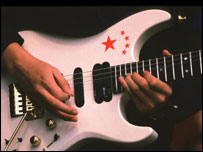Playing guitar