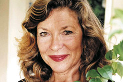 Carol Drinkwater holding an olive branch - image copyright Michael Trevillion