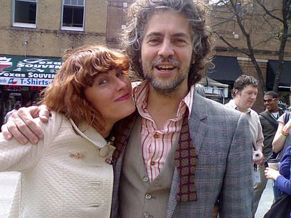 Tabitha cuddles up to 'uncle' Wayne Coyne