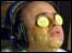 Man with cucumber on his eyes.