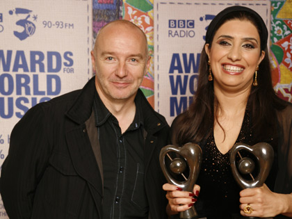 Ghada Shbeir with award presenter Midge Ure.