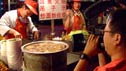 A chinese chef and a huge pot!