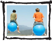 children playing on space hoppers