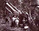 Image of British soldiers in action on the Somme with a 15-inch howitzer gun, July 1916