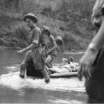 Towing Than Shwe on a lilo down the river Chaunggyi.  May 8th 1942