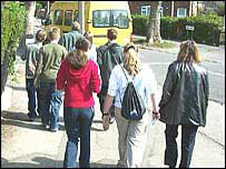 children from Clifton School, plus their teacher, embarking on a local history walk