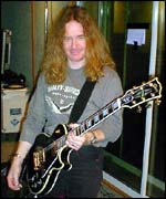 Saxon guitarist Doug Scarratt