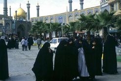 Image: Women outside the entrance to the Holy Mosque in Qom, Iran