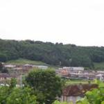 July 2005: Whitehaven, Cumbria.  A view across the Valley towards ‘The Brows’, Arrowthwaite, Kells, Whitehaven, Cumbria.  On 14 October 1943 an Avro Anson training aircraft crashed on this hillside killing all five crewmen.  (The woodland was planted after World War Two)
