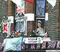 Photograph showing a house decorated for Silver Jubilee