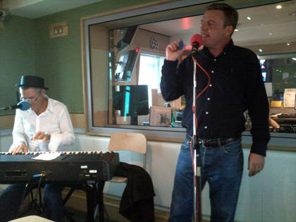 Madness (or part of Madness ) drop in on Dermot for a right proper London knees-up