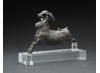 A bronze sculpture showing an acrobat leaping over a bull's head. © Trustees of the British Museum