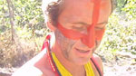 Bruce takes a walk up a nearby hill with the Kayapo