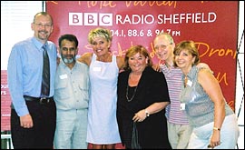 BBC Radio Sheffield's Andy Kershaw (left) and Gerry Kersey (2nd from right) with carers from our area at the local launch of Ring Around Carers