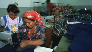 Women at sewing machines in factory