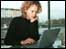A woman using a laptop computer
