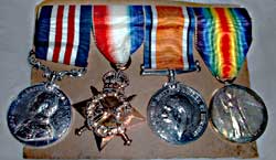 Left to right: Military Medal, Mons Star, Defence Medal and Victory Medal.  Awarded to Samuel Craig.