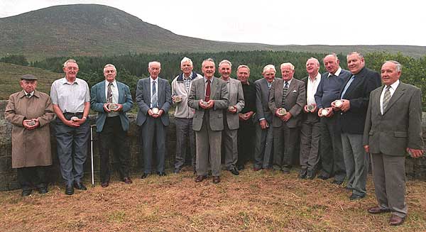 The reunited Tunnellers each received a plaque set in Mourne Granite, commemorating their achievement of fifty years ago.