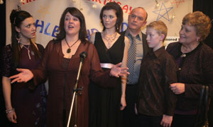 Jade (Linzey Cocker), Pauline (Kathryn Hunt), Ashley (Sinead Moynihan), Terry (Connor McIntyre), Mikey (Lee Worswick) and Nana Howard (Rita May) at Ashley's birthday party.